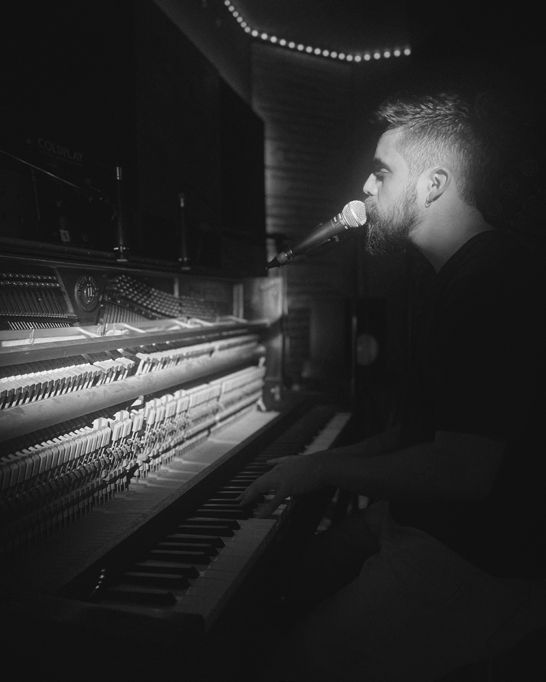 New4est on vocals and piano